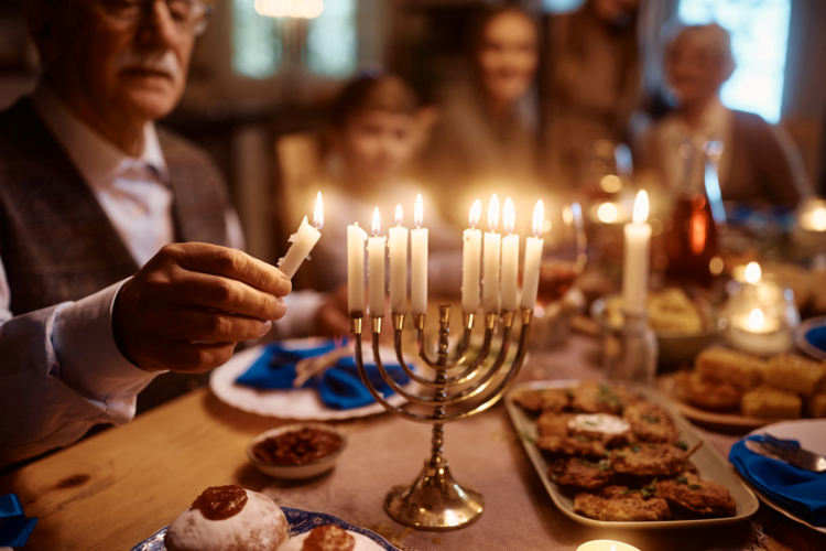 Hanukkah family meal and menorah lighting