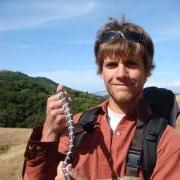 Daniel Preston holding a snake