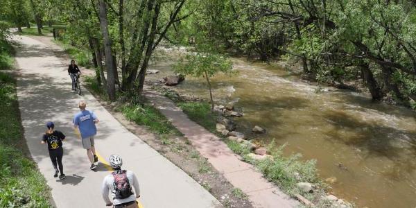 Cyclists and pedestrians using the Boulder Creek Path