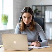 young person taking a webinar