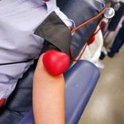 Person donating blood at a CU Boulder blood drive